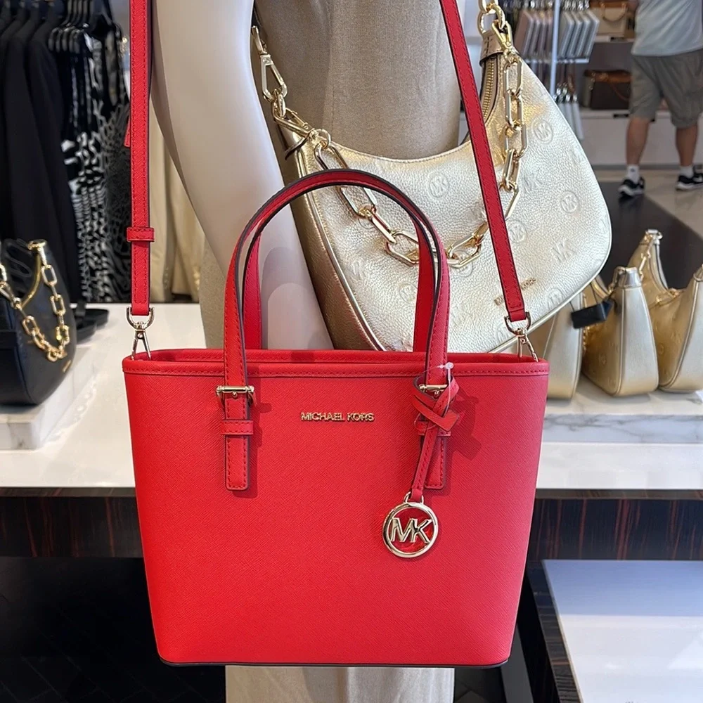 MICHAEL KORS
Jet Set Travel Extra-Small Saffiano Leather Top-Zip Tote Bag
NWT - Picture 9 of 16